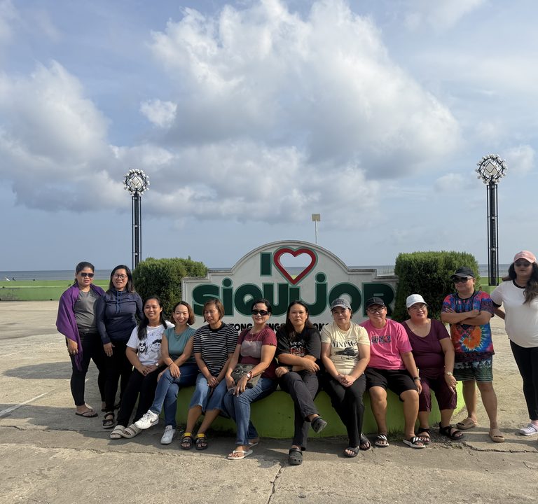 Guests at the I Love Siquijor sign